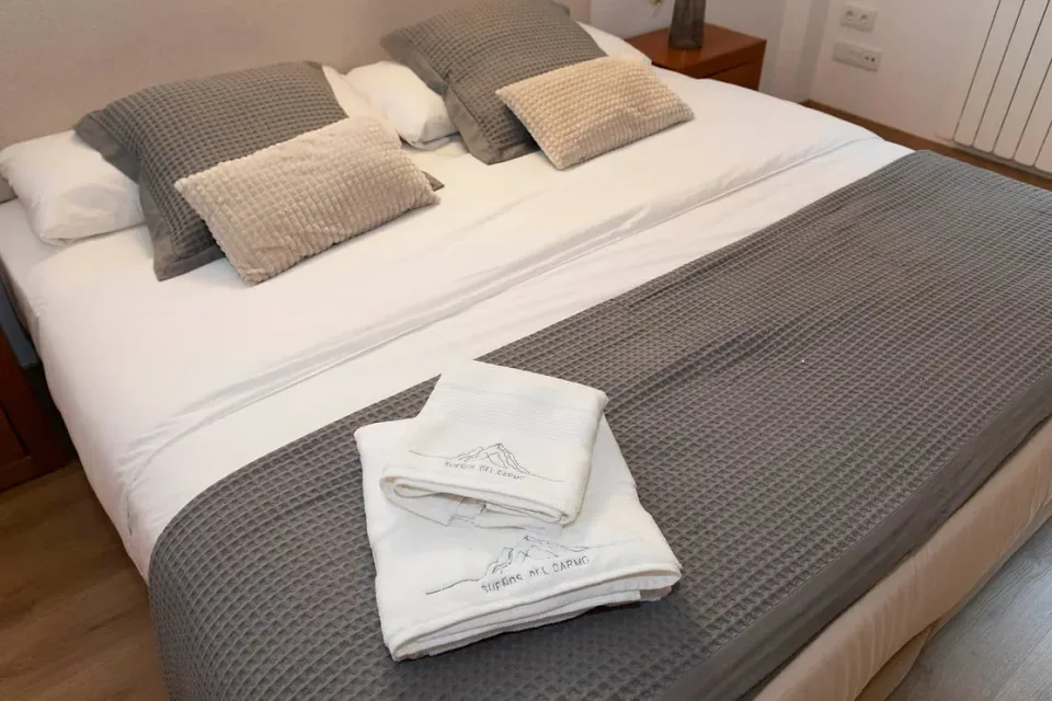 Bedroom details. Bed linen and towels ready for a comfortable start to your stay.
